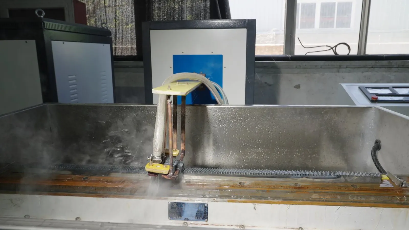 Induction hardening of gear rack teeth with water quench